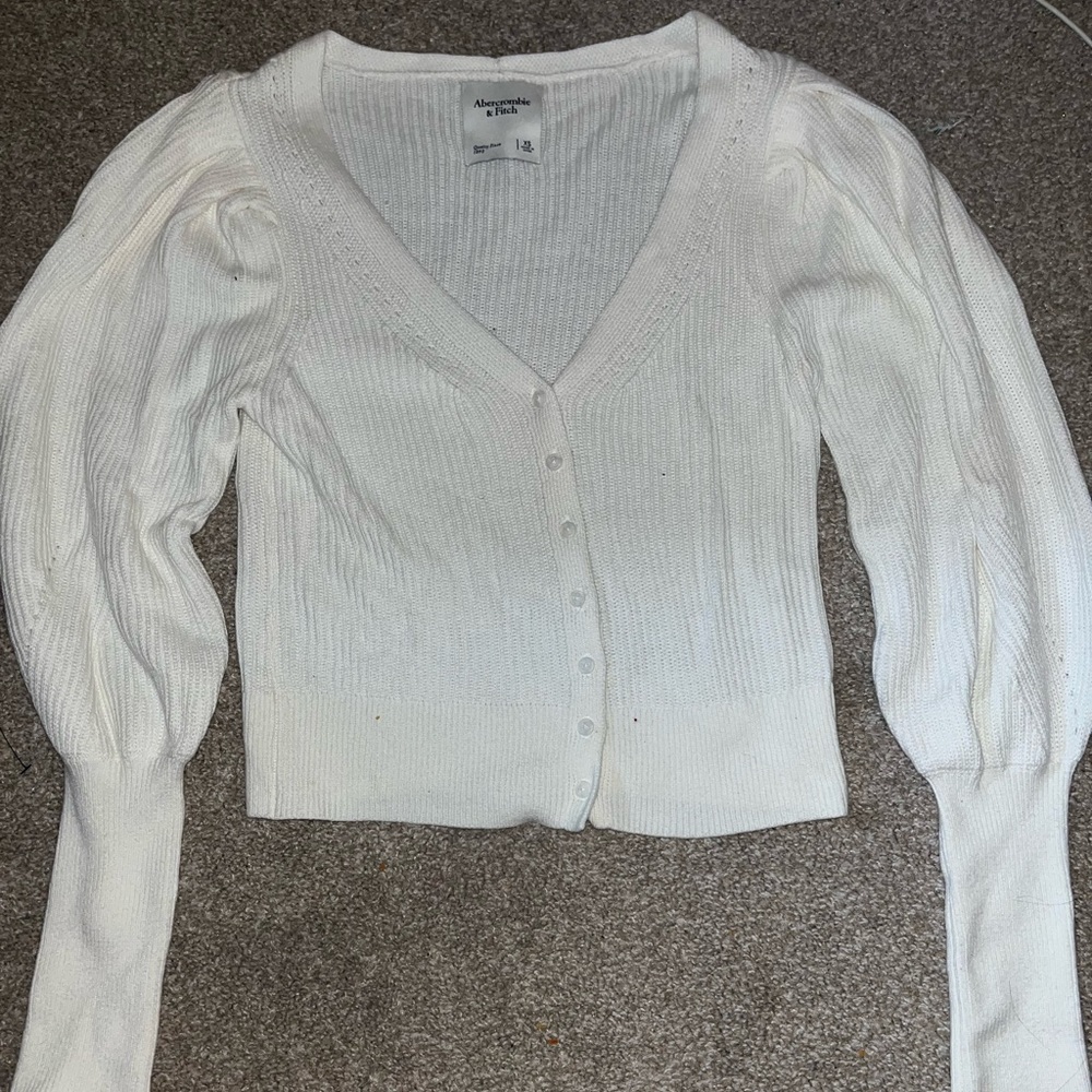 White Abercrombie and Fitch Sweater Cardigan.Never worn with no tags. Size XS.